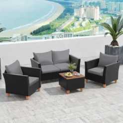 Tangkula 4-Piece Outdoor Wicker Conversation Set with Storage Coffee Table