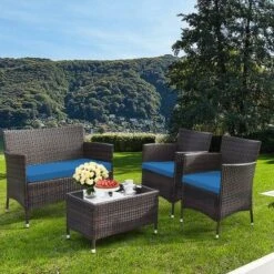 Tangkula 4-Piece Outdoor Rattan Conversation Set with Peacock Blue Cushions