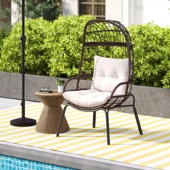 Tangkula PE Wicker Egg Chair Patio Cocoon Lounger W/ Comfortable Cushions & Metal Frame