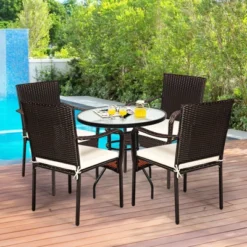 Tangkula 4 PCS Stackable Rattan Outdoor Dining Chairs with Waterproof Cushions