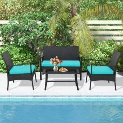 Tangkula 4PCS Patio Rattan PE Wicker Furniture Conversation Set W/ Sofa Chair & Table